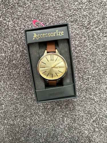 Accessorize curved gold face - accessorize,