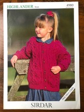 Sirdar 4980 knitting pattern child aran bobble textured jacket with pockets