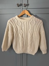 Cream hand knitted Aran cable