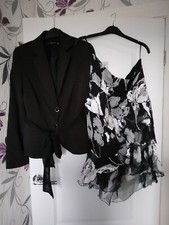 Raxevsky Ladies Suit. Size 14. BNWOT Black Jacket.BNWT 100% Silk Floral Skirt.