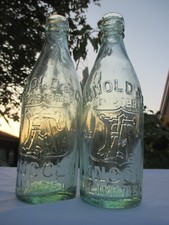 2x VINTAGE OLD ANTIQUE VICTORIAN BEER SODA BOTTLES ARNOLD & CO LINCOLN c1900