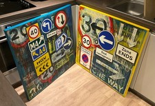  2 x UK street signs graffiti