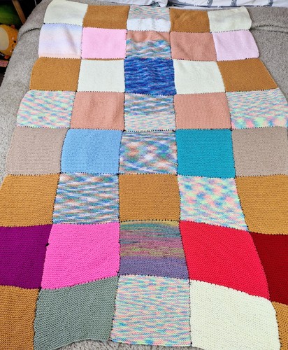 Hand knitted patchwork - hand, blanket