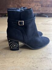 Brand new swede effect ankle length boots with gold studs on the heels. Size 7 
