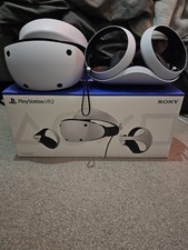 Sony PlayStation VR2 Headset with official controller charger. 