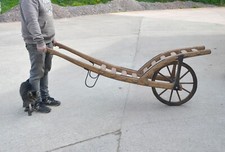 old wooden barrel trolley