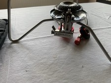 Camping portable stove suitable for fishing or hiking with self ignition.