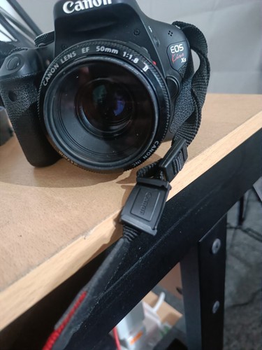 Canon with 50mm lens - 50mm,