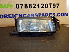 1991 MAZDA 323 BG OSF DRIVER SIDE RIGHT FRONT HEADLIGHT TYC 20-1612B