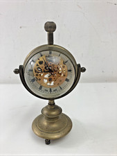 (RefJOH41) Antique small brass pedestal mantel desk clock Swiss made unusual
