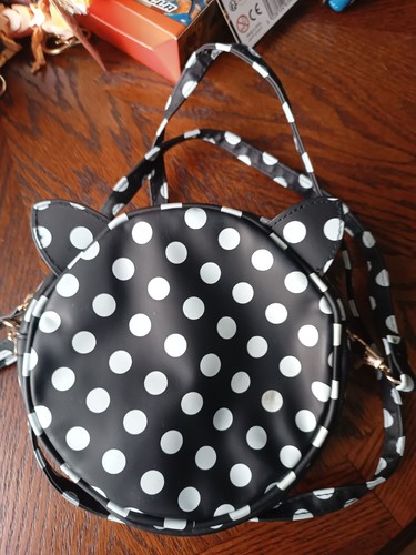 Black polka dot small clutch