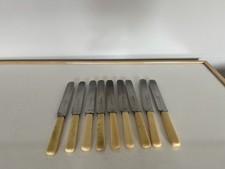 SET OF 9 COMPOSITE HANDLED AND