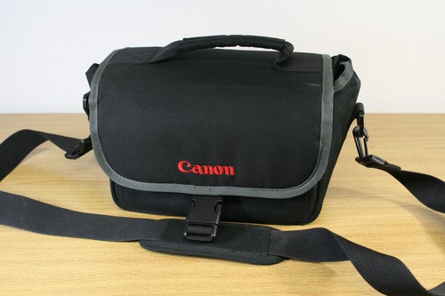 Small black canon camera - small,