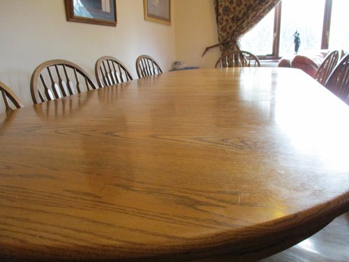 Large oak dining table and - , 10