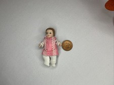 1:12 Scale Porcelain Baby Doll in Pink Dress & White Knit Tights – Miniature