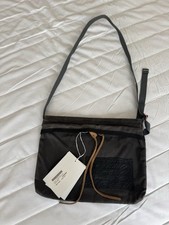 Acne Studios  Andemer Wax Cross Body Bag in Pink/Fluo Pink Grey