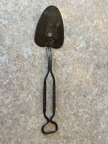 Antique metal bottle opener - bottle,