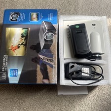 LED Projector with LCD image system with built in speakers, new packed