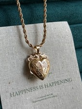 Gold tone heart locket - gold,