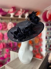 NAVY BOATER STYLE HAT WITH GOBLET FEATHER FLOWERS