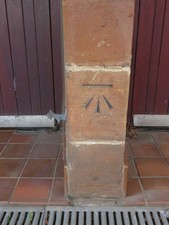 Photo A2 Bench mark on Temperance Hall, George Street Chester This bench c2015