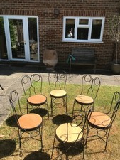 Six early 20th century French ice cream parlour chairs iron frames & penny seats