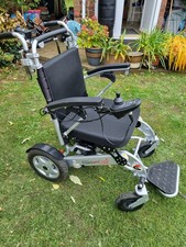 Freedom A06L Lightweight electric folding wheelchair with  attendant control