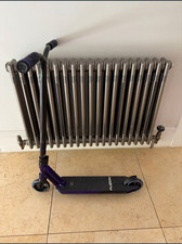 Purple trick scooter for skate parks. Very lightly used virtually brand new.