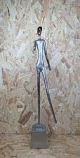 Elongated Human Figure