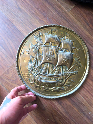 Embossed brass round - embossed, wall