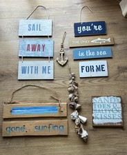 Job Lot of Beach Signs Hanging