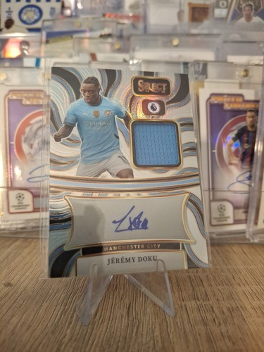 Man city jeremy doku - man,