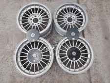 4 genuine Alpina wheels with original center caps 