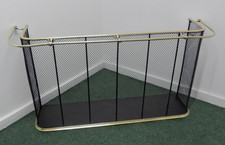ANTIQUE   WIRE MESH AND BRASS NURSERY FIREGUARD WITH A  BRASS AIRING RAIL.