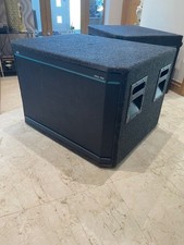 2 number Peavey Hisys TM 2 x 15" Black Widow equipped subwoofer speakers.