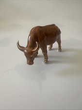 This vintage ceramic figurine