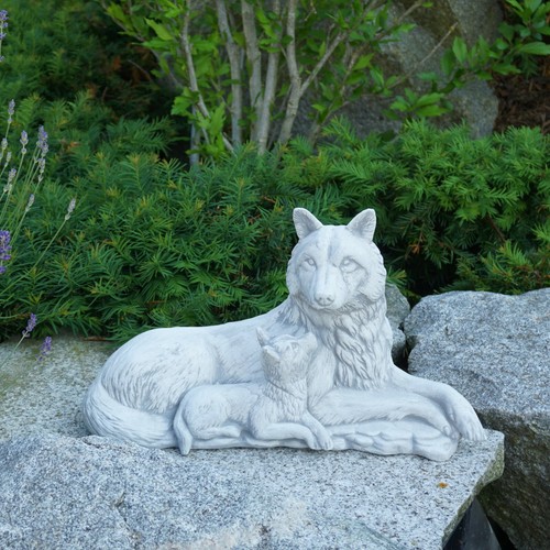 Wolf with boy - , stone