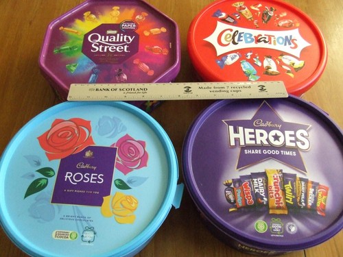 Four empty chocolate plastic - chocolate,