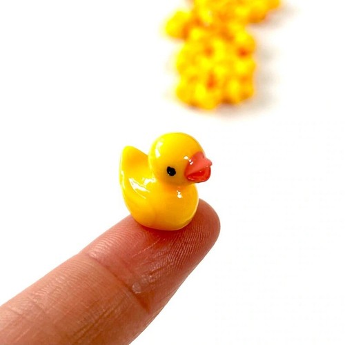 Yellow plastic rubber duck - plastic,