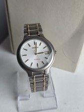 Vintage Seiko Titanium 7N42-8090 Men's Quartz Watch Gold Tone Date.