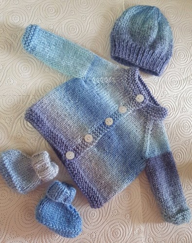 Hand knitted baby - hand,