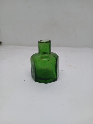 Old green glass octagonal - green,