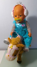 Zapf Baby Born girl doll on Walking Horse.