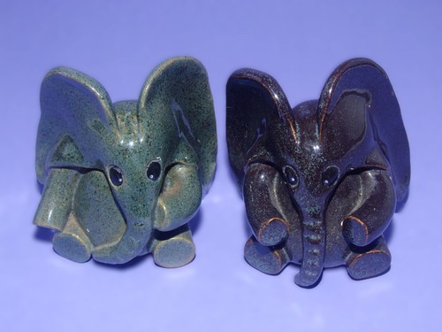 Two small pottery - small, elephants