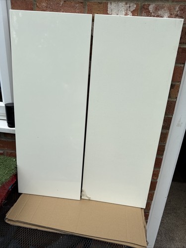 Two cream gloss slab kitchen - x,
