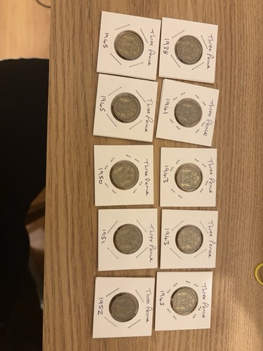 Brass pence pieces - 3,