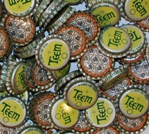 Soda pop bottle caps - of, 12