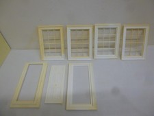 plastic dolls house windows x 4/ and 1 door and frame