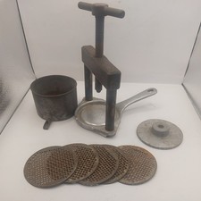 Metal fruit press kitchenalia - press,
