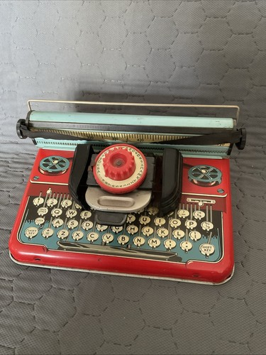 The mettype junior tin toy - the,